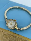 LADIES YELLOW METAL BULOVA WRISTWATCH, expandable plated bracelet, in vintage Bulova watch box