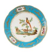 18TH C. SEVRES PORCELAIN PLATE, painted with a pair of pheasants within bleu celeste border reserved