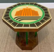 ART DECO STYLE OCTAGONAL OCCASIONAL TABLE, the glass top reverse painted with a modernist
