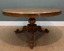 MID-VICTORIAN WALNUT BREAKFAST TABLE, circular tilt-action quarter veneered top, ornately carved