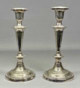 PAIR OF ELKINGTON & CO. PLATED CANDLESTICKS, with bead and engraved decoration, tapered circular