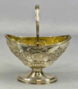 EDWARD VII OVAL SILVER SWING-HANDLED BOWL, embossed with flowers, on oval stand, Goldsmiths &