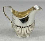 EDWARD VII SILVER JUG, oval form with gadrooned lower half, James Charles Jay, Sheffield 1903, 10.