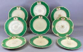 CHAMBERLAIN & CO. WORCESTER SET OF NINE ARMORIAL PLATES, with green glazed and gilded border,