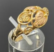 9CT TWO-COLOUR GOLD RING, open work leaf design, size O/P, 4.2gms Provenance: private collection