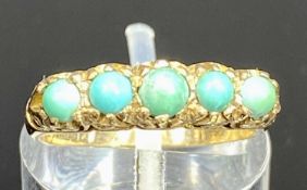 9CT GOLD FIVE STONE TURQUOISE RING in pierced mount, size K/L, 2.2gms Provenance: private collection