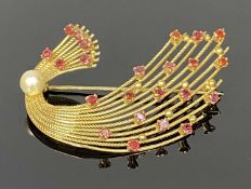 9CT GOLD STARBURST BROOCH set with small garnets and a pearl, approx. 50 x 35mms, 7.2gms Provenance: