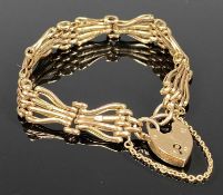 9CT ROSE GOLD GATE BRACELET with heart shaped padlock and safety chain, 14gms Provenance: private