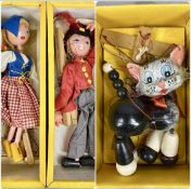 PELHAM PUPPETS, SS2 Dutch Girl, SS7 Fritzi, and A8 Cat, in original boxes Provenance: private