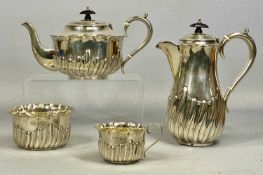 GEORGE V SILVER FOUR-PIECE TEA SERVICE, circular form with gadrooned decoration, Birmingham 1910/
