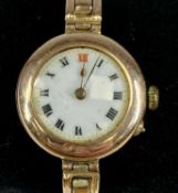 VINTAGE 9CT GOLD CASED LADIES' WRISTWATCH, circular white enamel dial with Roman numerals, on