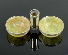 SILVER MOUNTED ONYX OPEN SALT & PEPPER with central toothpick holder, chased decoration, 5 x 11cms