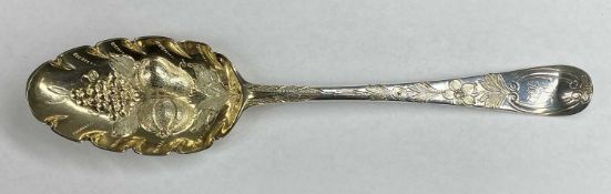 EARLY GEORGIAN SILVER BERRY SPOON, with ornate design to bowl and stem, 20cms (l), 68gms Provenance: