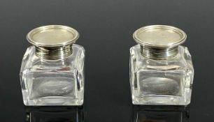 PAIR OF SILVER & CUT-GLASS INK WELLS, square form, with silver rims and hinged covers,