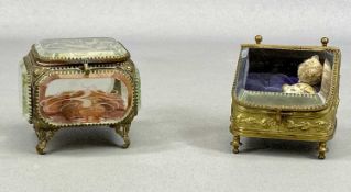 19TH CENTURY FRENCH GILDED BRASS TRINKET BOXES, one with sloping glass hinged cover and plush