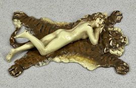 AFTER FRANZ BERGMANN cold painted bronze figure - nude woman lying on a tiger skin, stamped 'Nam