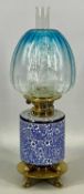 VICTORIAN OIL LAMP, c. 1885, gilded brass stand, Doulton Burslem blue and white floral reservoir and