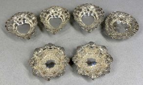 SET OF FOUR EDWARDIAN SILVER BONBON DISHES, heart shaped, pierced and embossed decoration, 9 x 8cms,