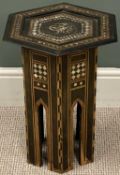 AN EASTERN HEXAGONAL TOP SIDE TABLE having mother of pearl inlay, 47 (h) x 34 (w) x 34cms (d)