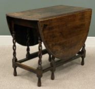 AN ANTIQUE OAK GATELEG TABLE having open twist supports and an oval top, 75 (h) x 51/146 (w) x