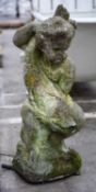 PAINTED MOULDED CONCRETE FIGURAL FOUNTAIN, depicting boy holding a large fish, 72cms (h) Provenance: