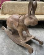 NOVELTY VINTAGE WOODEN ROCKING RABBIT, modelled seated on back legs with ears up, sleigh type