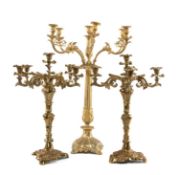 THREE GILT METAL CANDELABRA, comprising pair of five-light candelabra, 61cms (h), and single seven-