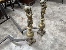 PAIR OF 19TH C. BRASS FIGURAL CHENETS, cast as putti holding cornucopia on sphere bases, 67cms (h)