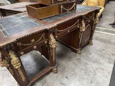 GEORGE III STYLE PARCEL-GILT PARTNER'S DESK, after the Nostell Priory desk by Thomas Chippendale,