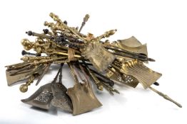 ASSORTED BRASS & CAST IRON FIRE IRONS, various pokers, shovels and tongs (qty) Provenance: The
