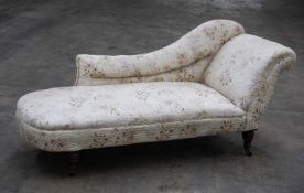 VICTORIAN WALNUT CHAISE LONGUE, scroll back and side with floral quilted upholstery, turned legs,