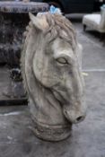 MOULDED CONCRETE FIGURE OF A HORSE'S HEAD, wearing ornamented collar, 90cms (h) Provenance: The