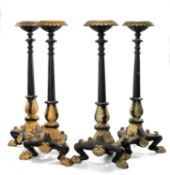 SET OF FOUR PARCEL-GILT, EBONISED & CAST IRON TORCHÈRES, gadrooned rims, reeded columns, leaf cast