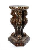 LARGE CONTINENTAL TREACLE GLAZED TERRACOTTA JARDINIÈRE STAND, three leopard monopodia to canted