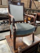 TWO NAPOLEON III MAHOGANY FAUTEUILS, both with square backs, downturned arms, upholstered backs,