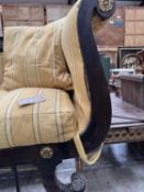 REGENCY ROSEWOOD & BRONZE MOUNTED SCROLL END SETTEE, frame with rose and anthemion appliqués on