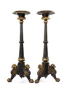 PAIR OF PARCEL-GILT, EBONISED & CAST IRON TORCHÈRES, gadrooned rims to fluted columns and leopard