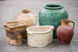 FIVE STONEWARE VESSELS, including large green-glazed plant pot, 59cms (h) Provenance: The Cornelia