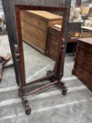 WILLIAM IV MAHOGANY CHEVAL MIRROR, rectangular plate between anthemion topped tablet uprights,