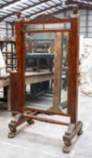 GEORGE IV MAHOGANY CHEVAL MIRROR, scrolled cresting rail between cast metal Greek female bust