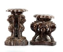 PAIR OF CONTINENTAL TREACLE GLAZED TERRACOTTA CONSERVATORY SEATS, largest modelled with leopard