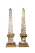 PAIR GRAND TOUR STYLE VARIEGATED MARBLE OBELISKS, stepped gated bases and plinths, measurements to