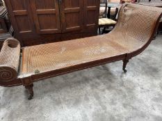 EARLY 19TH C. MAHOGANY CANED DAYBED, finely caned with scroll back and over scrolled foot,