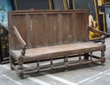 JOINED OAK SETTLE, early 19th C., high panelled back, turned legs, down swept arms, peripheral