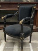 WILLIAM IV STYLE PARCEL-GILT & EBONISED ARMCHAIR, foliate carved detailing, black velvet upholstery,