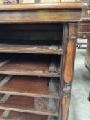 19TH C. ROSEWOOD OPEN PLAN CHEST, moulded top above baluster pilasters flanking four pull-out slides