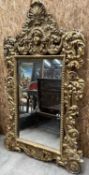 LARGE PAIR OF LOUIS XIV STYLE GILTWOOD WALL MIRRORS, heavily carved with scrolling acanthus,