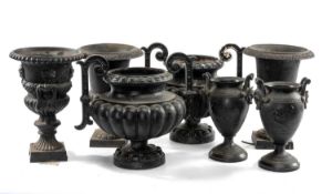 ASSORTED CAST METAL URNS, including pair decorated in the Greek taste, with twin mask handles, 27cms