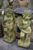 PAIR OF MOULDED CONCRETE ALLEGORICAL FIGURES OF THE SEASONS, modelled as putti with wheat sheaves