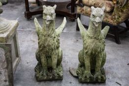 PAIR OF RECONSTITUTED STONE GRIFFONS, modelled seated facing front, 74cms (h) (2) Comments: one with